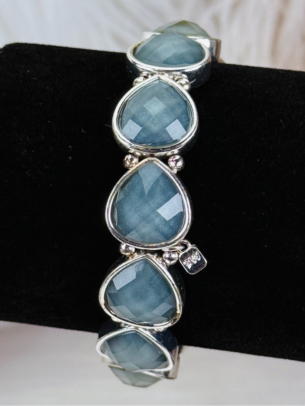 Silvertone with blue accent stretch bracelet